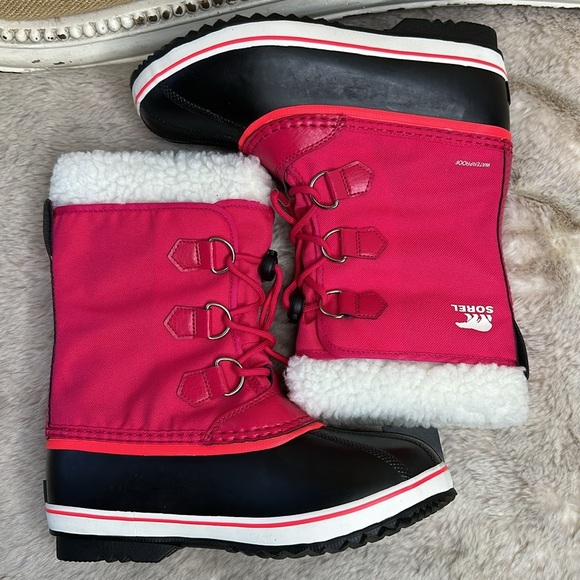Sorel | Kids' Yoot Pac Waterproof Snow Boot in Bright Rose - Picture 11 of 16